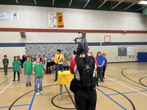 A cameraman filming the game show
