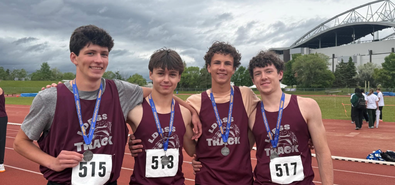 Picture of relay team with silver medals