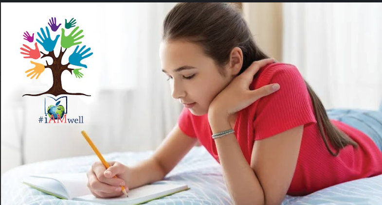 girl writing in a notebook