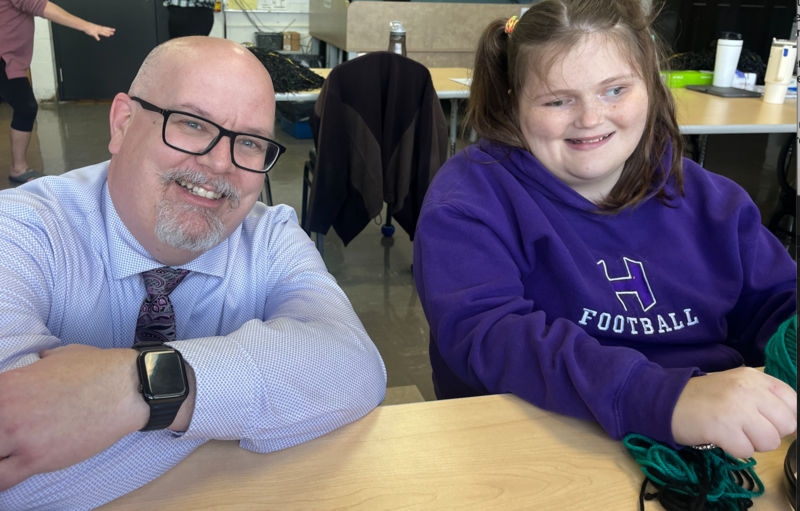 Photo of a superintendent with a student.