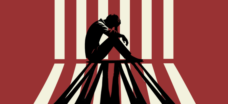 red background white stripes silhouette of person sitting with head in hands