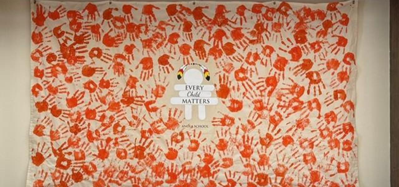 Orange handprints in support of Truth and Reconciliation Day.