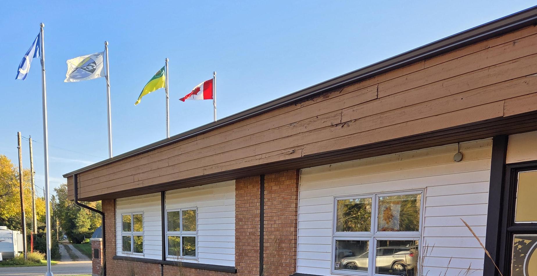 view of the flag from the front door of the school