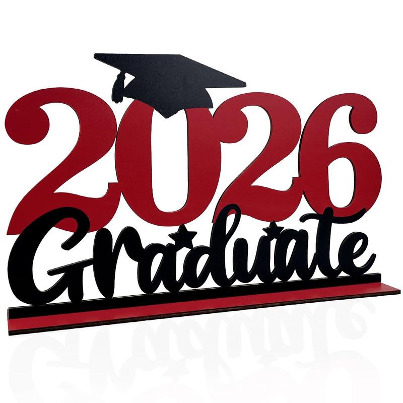 Red “2026” with a black graduation cap above and the word “Graduate” in black script below, displayed as a decorative sign celebrating graduation.