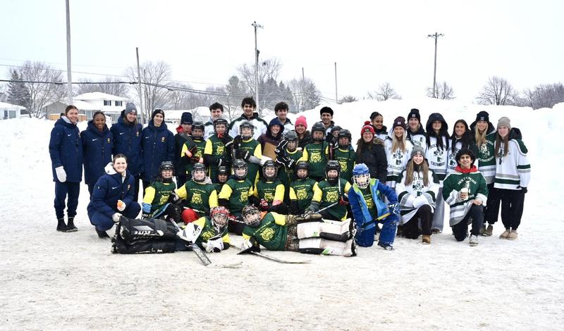 Frontenac Cup Ball Hockey Tournament celebrates 10 years. Group photo of event organizers, Queens University varsity athletes, grade 12 students from the Holy Cross Catholic Secondary School Leadership class and grades 4-6 students from St. Patrick Catholic Sshool in Harrowsmith.