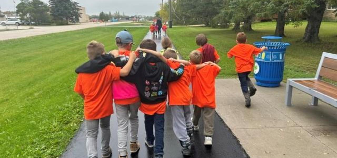 Students participating in a walk in honour of Truth and Reconciliation Day.