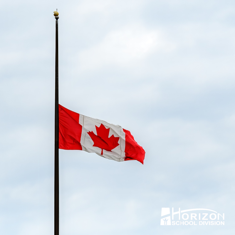Image of a Canadian flag at half mast