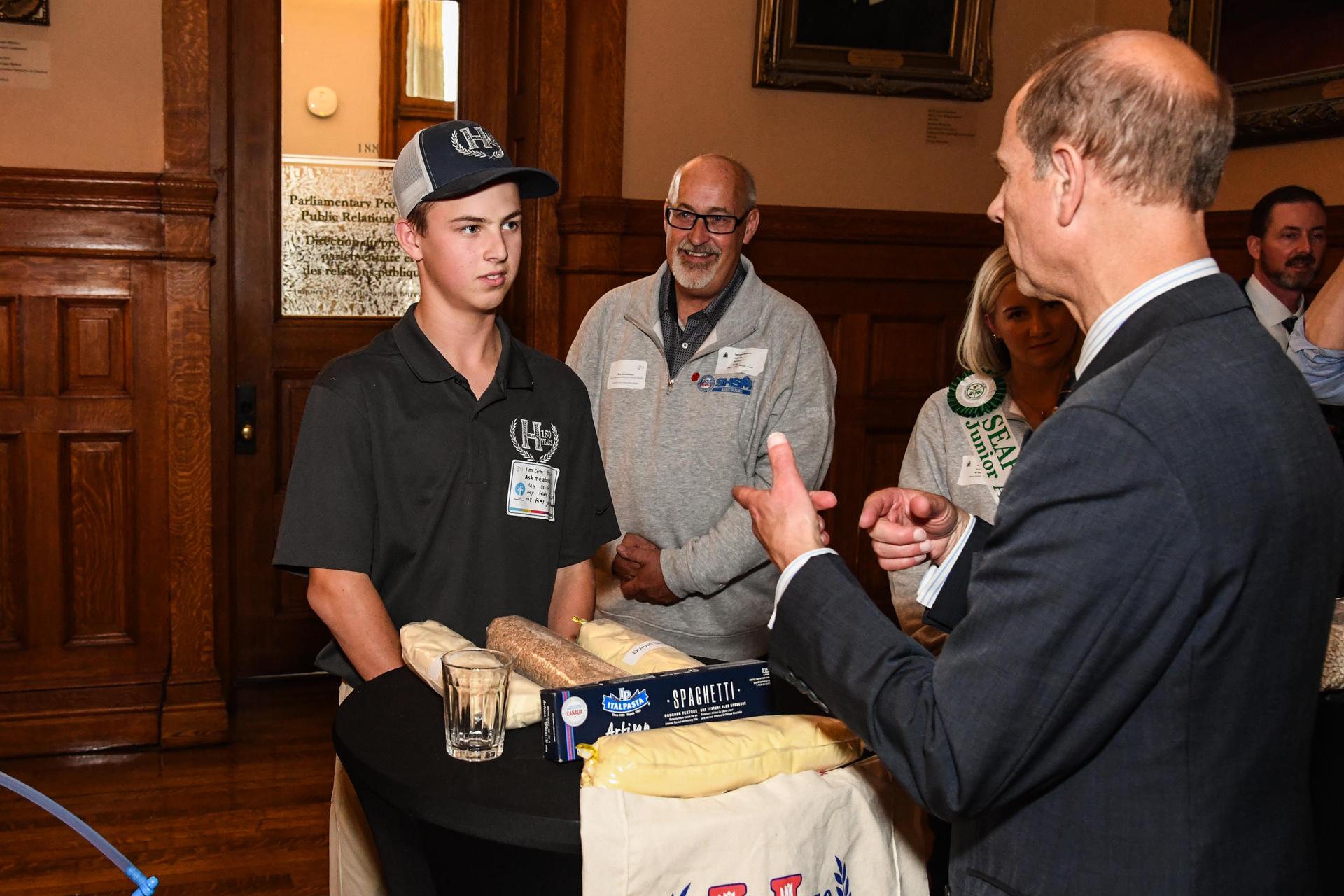 Carter speaking with the Duke of Edinburgh