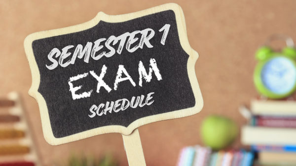 Sign reading Semester 1 exam schedule