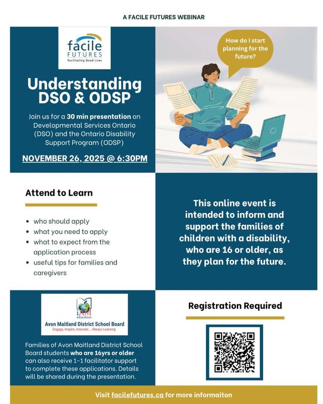 A student in front of a computer holding papers