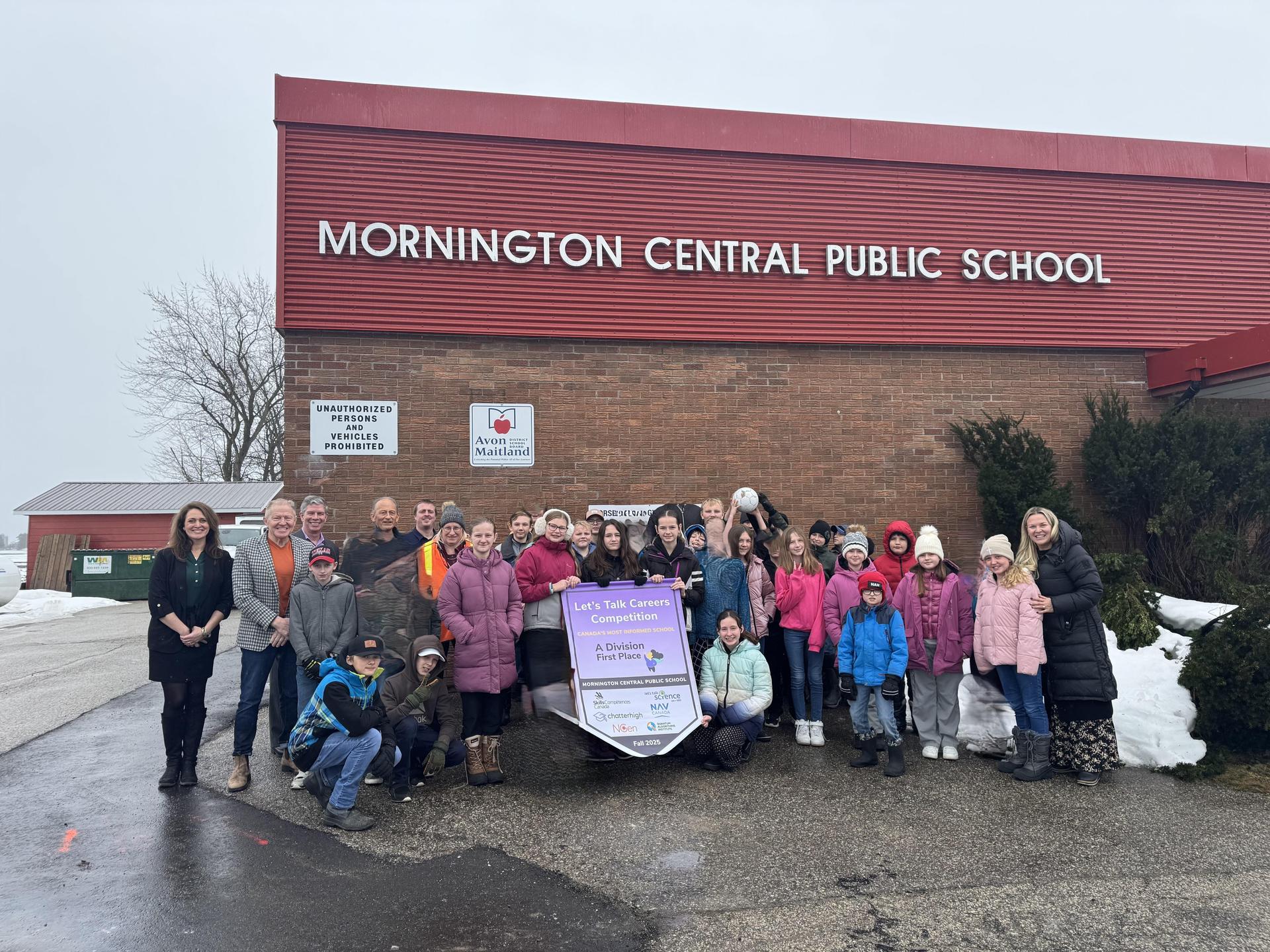 Group of Mornington Central PS students standing outside school building