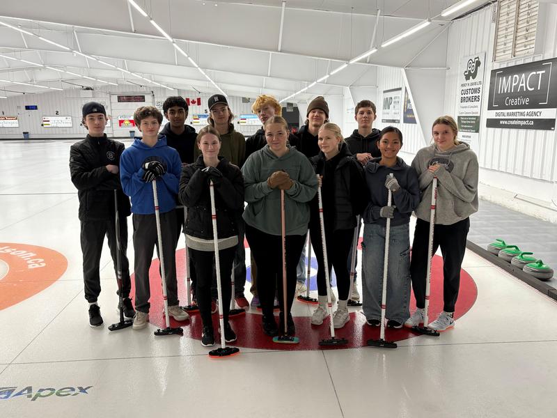 Students curling in PE Class