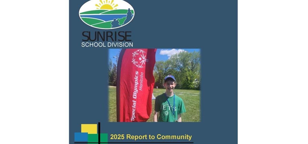 A student standing in a field with a medal around his neck. I read flag standing beside him reading Special Olympics Manitoba.