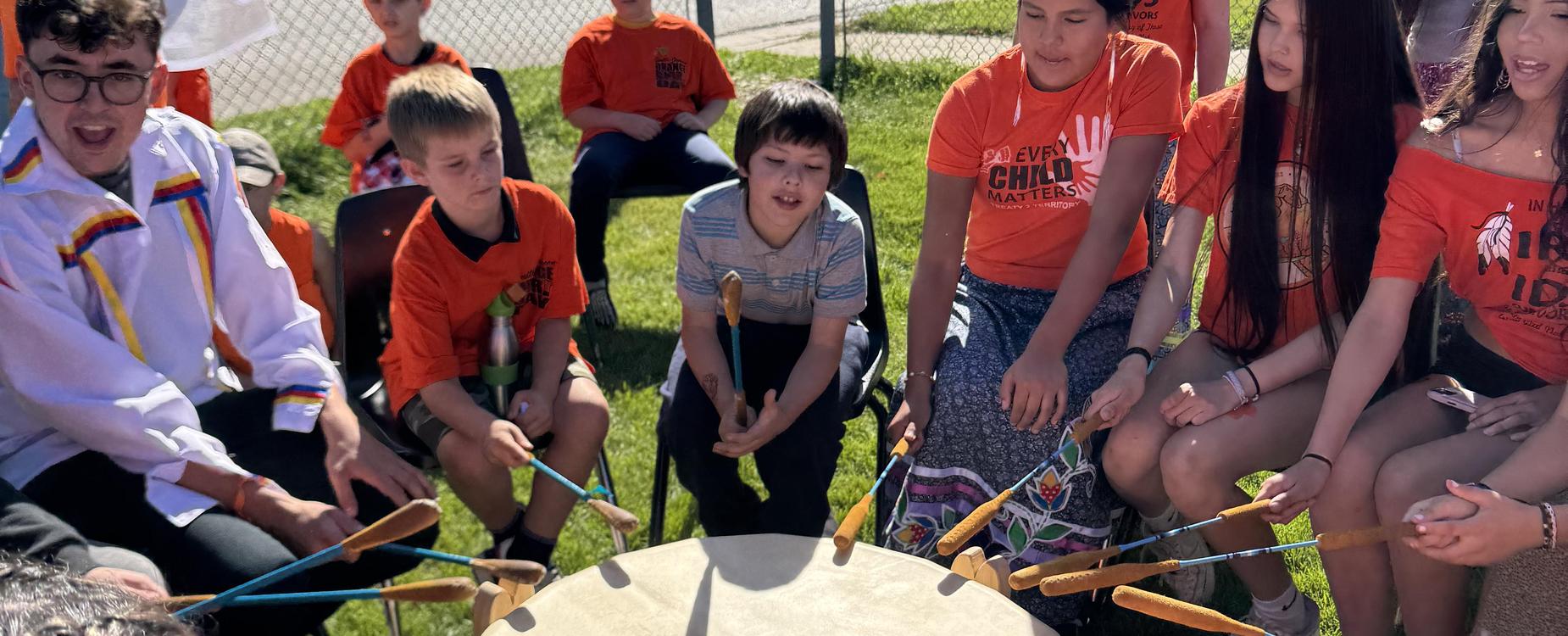 SJS students joining the drummers st MMS