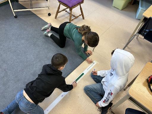 students working together on a math problem