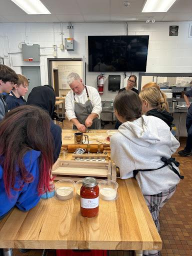 Gr 7/8 students in the gnocchi board session with chef Nathan Brown