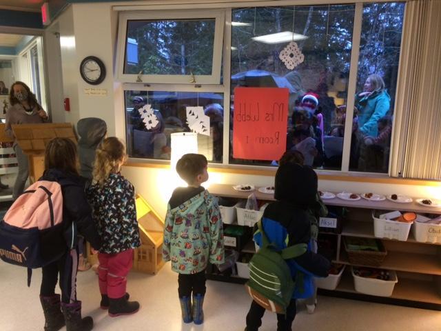 Kindergarten watching the carolers
