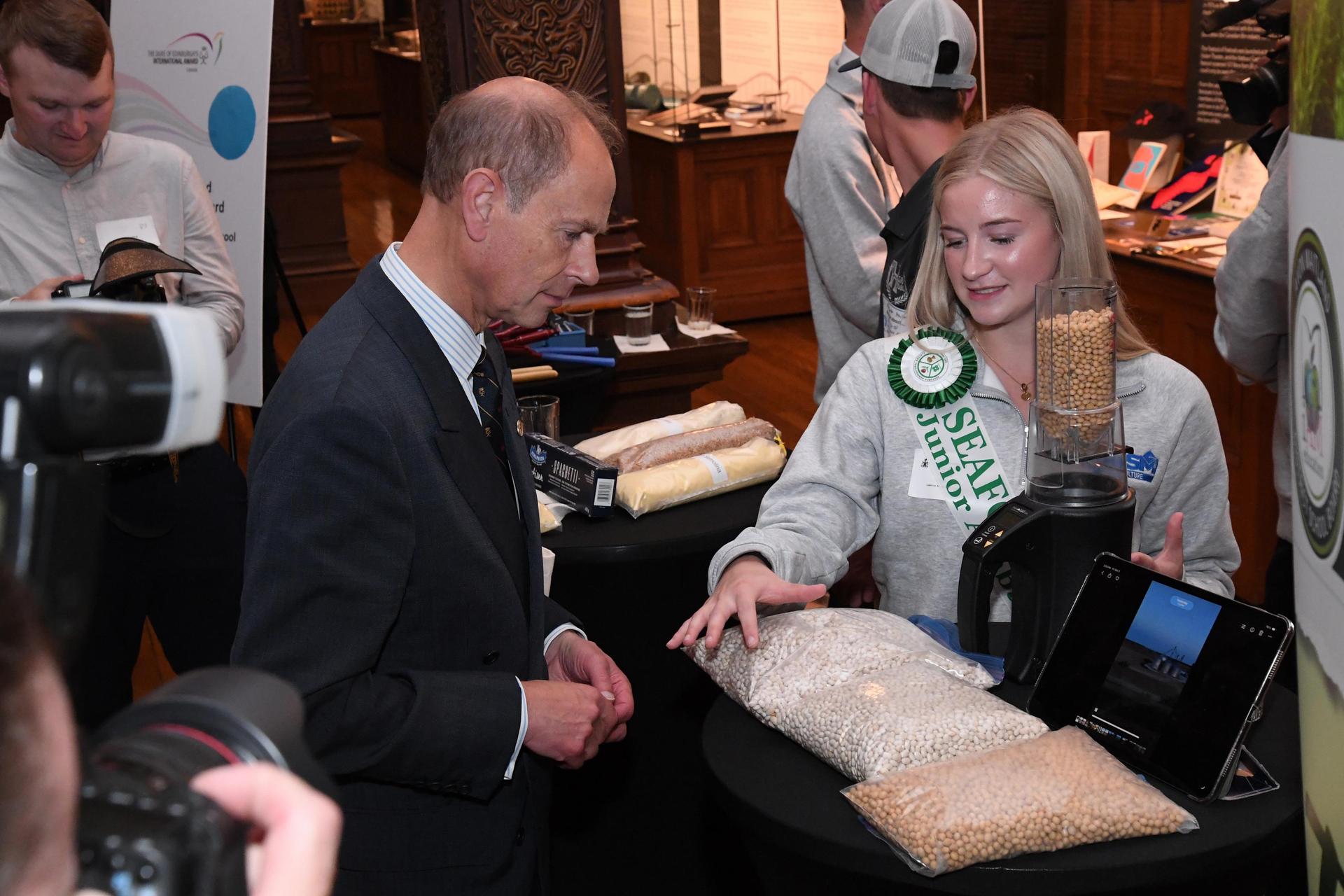 Hannah speaking with the Duke of Edinburgh
