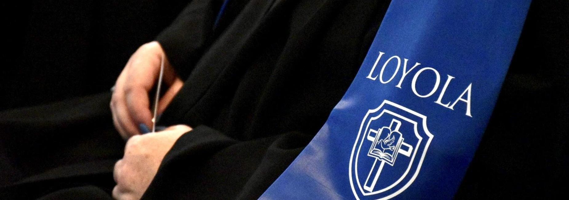 Loyola graduation banner.