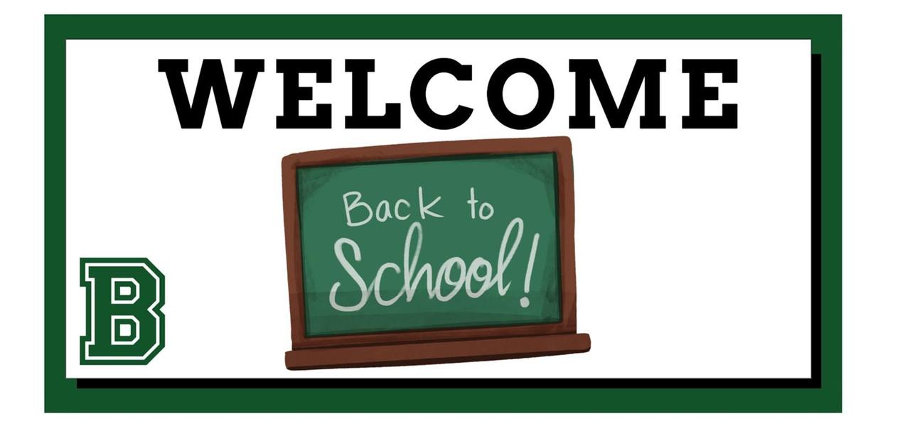 Welcome sign with chalkboard, announcing back to school.