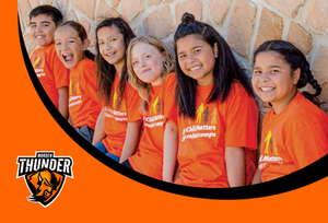 Students wearing orange shirts.