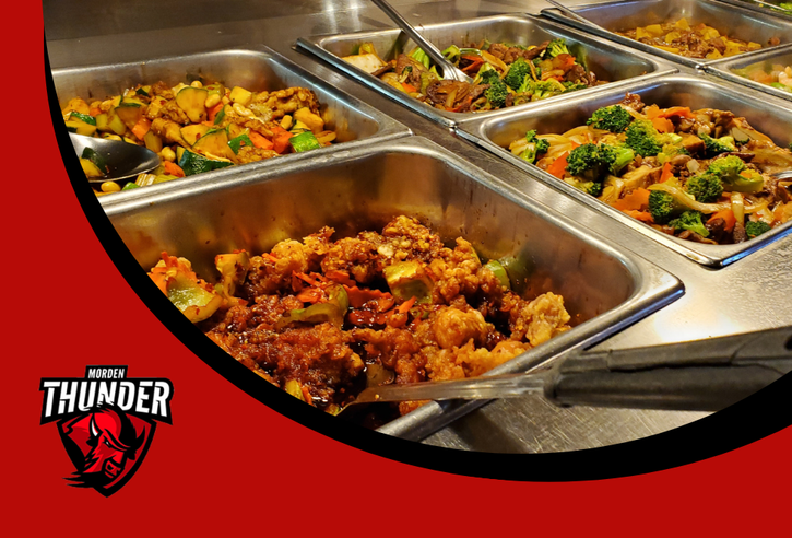 A picture of food in a cafeteria.