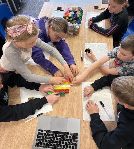 Students working together on a math problem