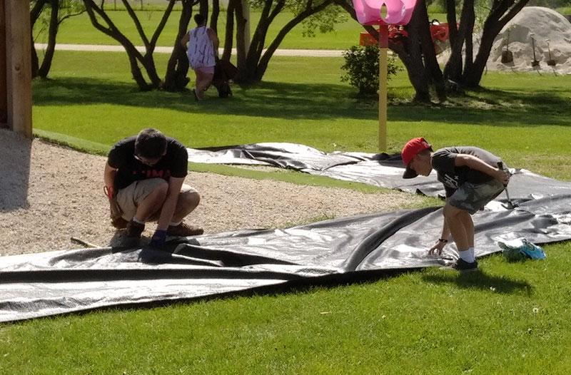 Image of people building playground.