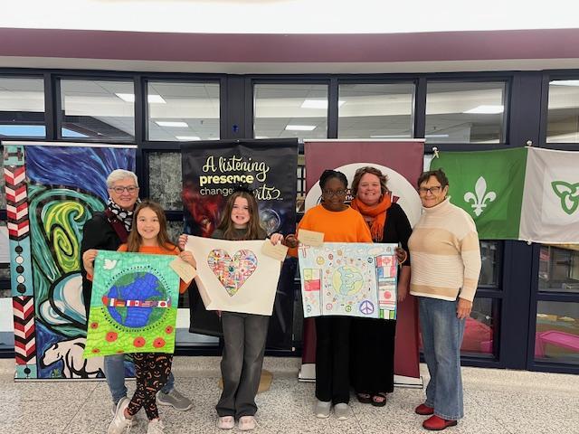 A Photo of 3 winners of Peace Poster Contest