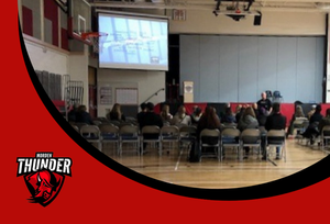 A picture of a ceremony in the MCI gym.