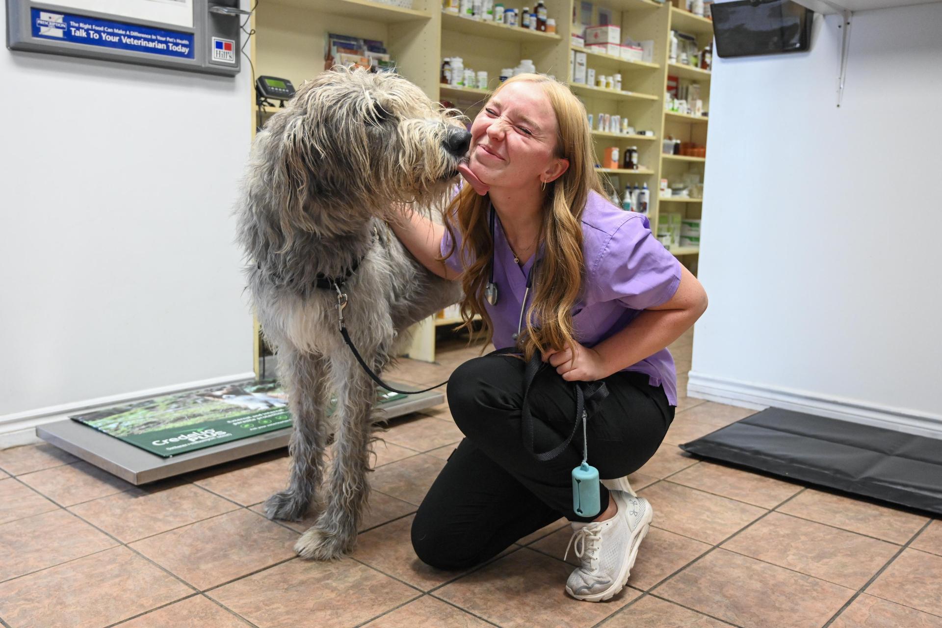 student with a dog.