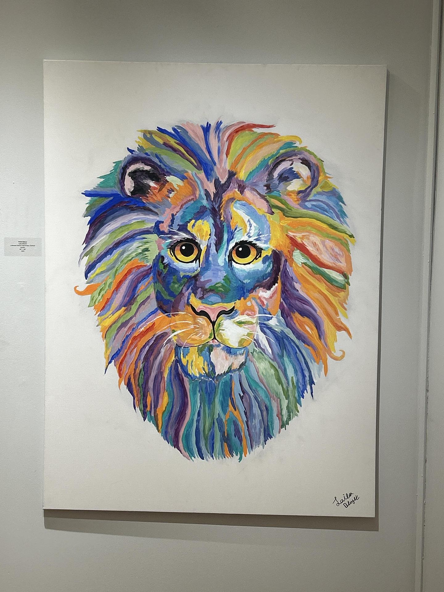 A piece of student art work (colourful lion)