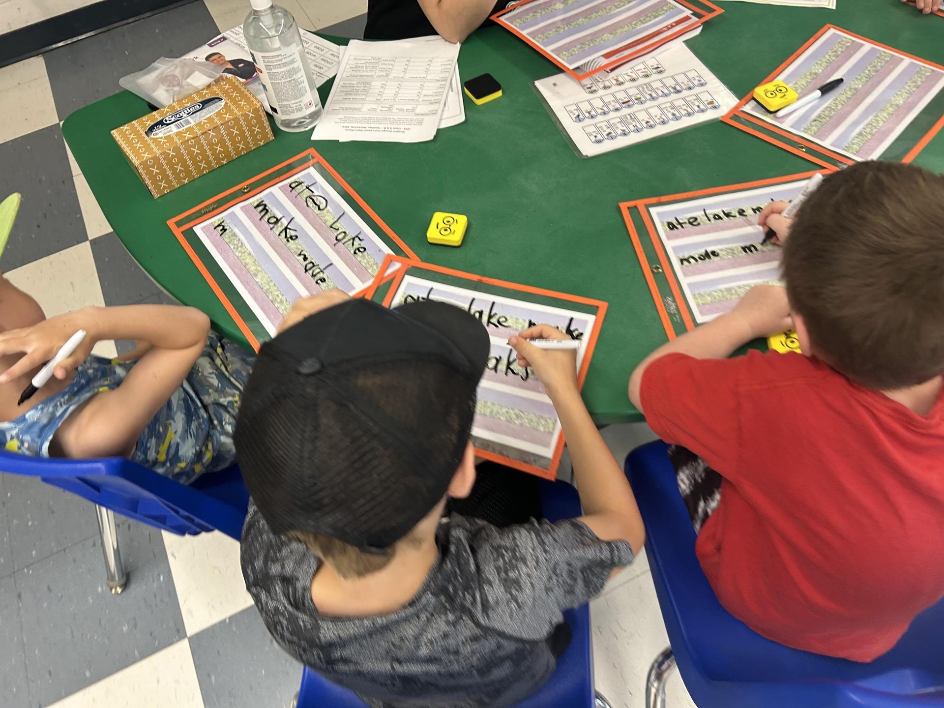 elementary summer students working on math
