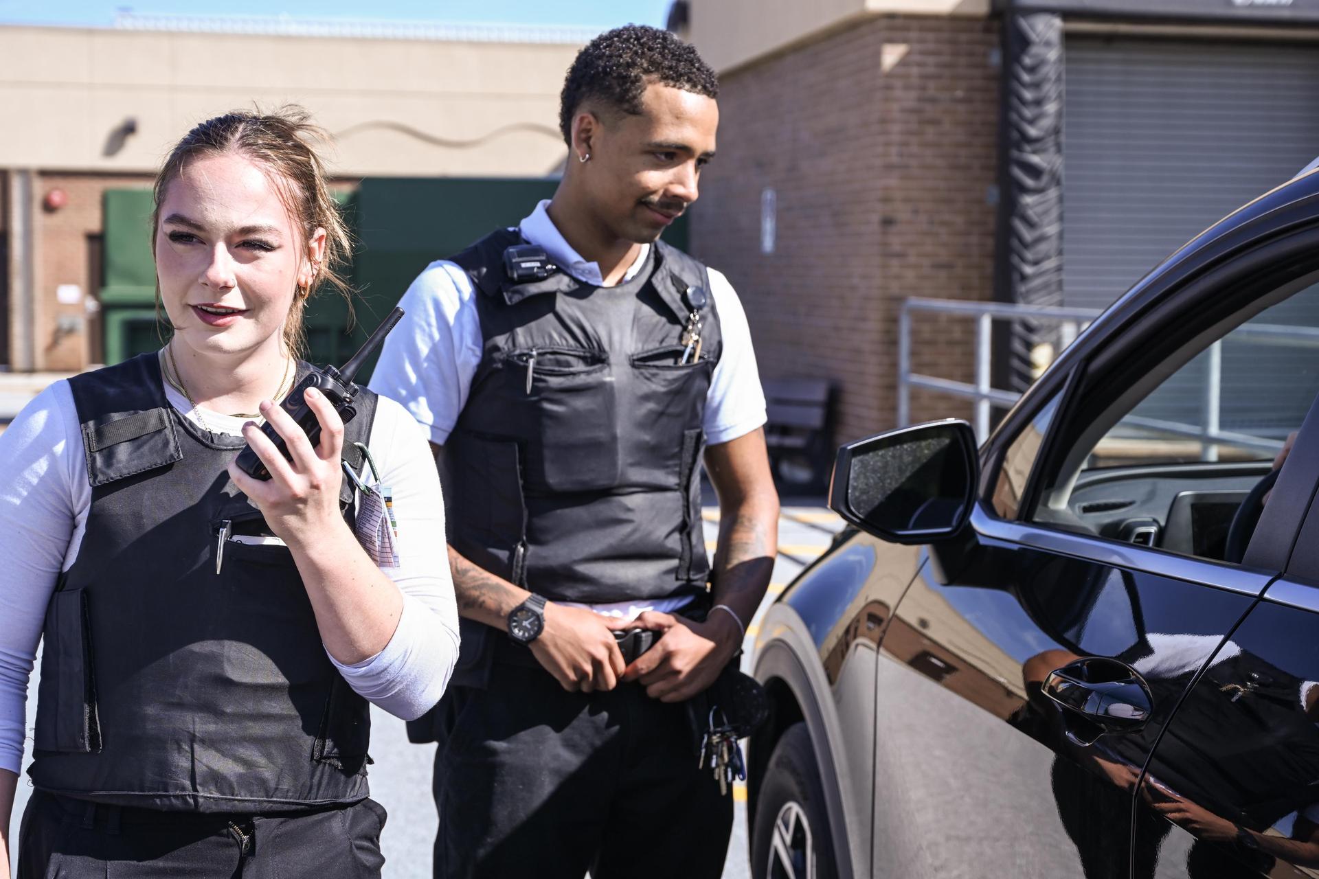 two students dressed in police officer gear